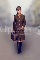 Elegant woman in a brown army uniform