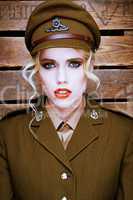 Attractive blond model in army uniform