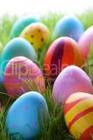 Many Colorful Easter Eggs On Green Grass