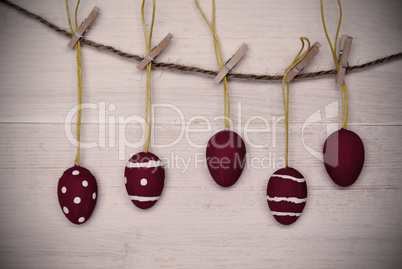 Five Red Easter Eggs Hanging On Line With Frame