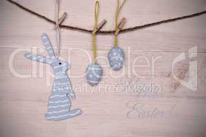 Blue Easter Bunny And Easter Eggs Hanging On Line With Happy Easter