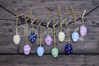 Many Colorful Easter Eggs Hanging On Line