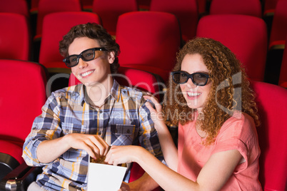 Young couple watching a 3d film