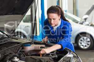 Mechanic working under the hood