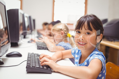 Cute pupils in computer class