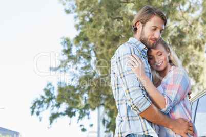 Cute couple standing and hugging