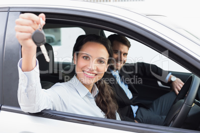 Business team smiling and driving