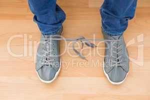 Mans shoes with tangled laces