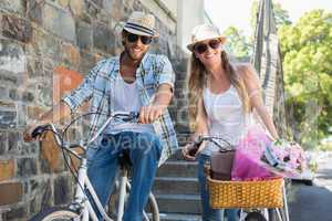 Attractive couple on a bike ride