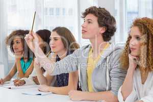 Fashion students being attentive in class