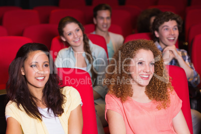 Young friends watching a film Young friends watching a film