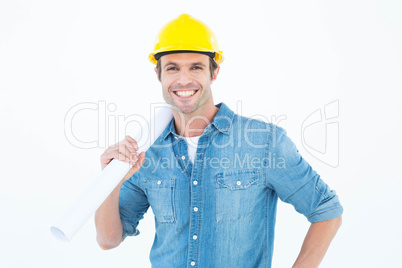 Confident architect holding rolled blueprint