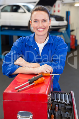 Mechanic smiling at the camera