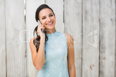 Stylish brunette on the phone