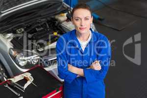 Mechanic looking up at camera