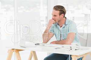 Concentrated businessman working with computer