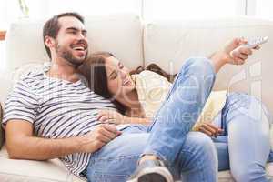 Cute couple relaxing on couch