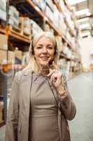 Smiling woman wearing a headset