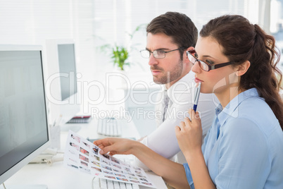 Thoughtful business coworkers working attentively