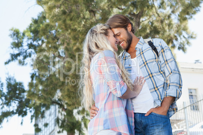 Cute couple standing and smiling