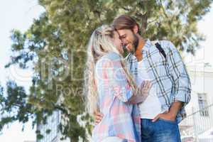 Cute couple standing and smiling