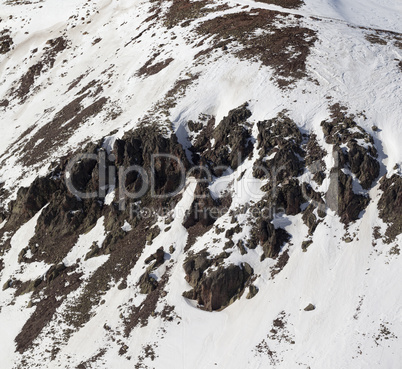 Off-piste slope with stones in little snow year