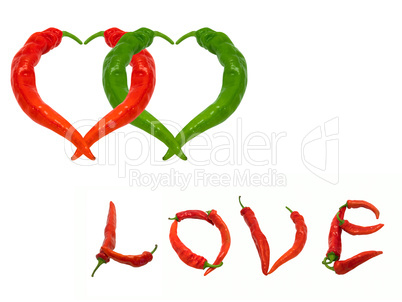 Two hearts and word Love composed of red and green chili peppers