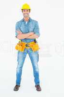 Carpenter standing arms crossed over white background