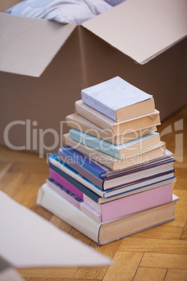 Pile of books on the floor