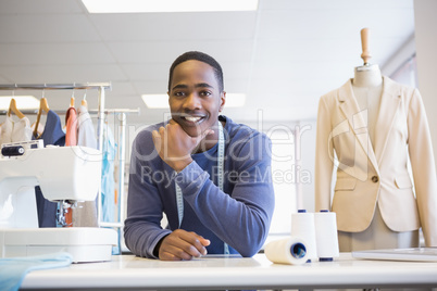 Smiling university student with meter posing