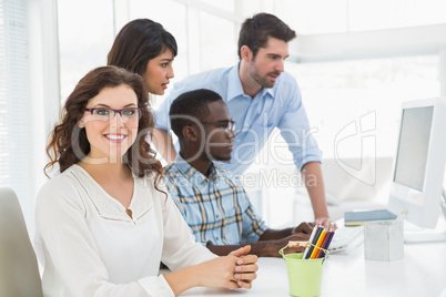 Teamwork using computer monitor together