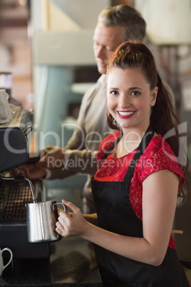 Barista making a cup of coffee