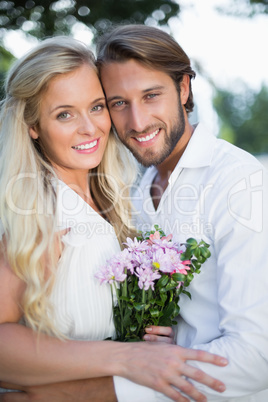 Attractive couple smiling at camera