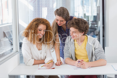 Students working together in class