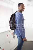 Smiling university student with backpack