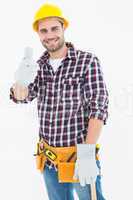 Happy male repairman gesturing thumbs up