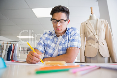 Concentrated college student drawing picture