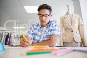Concentrated college student drawing picture