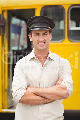 Smiling bus driver looking at camera