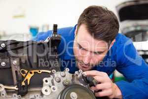 Mechanic working on an engine