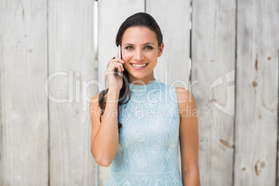 Stylish brunette on the phone