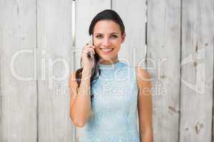 Stylish brunette on the phone