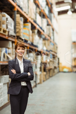 Female manager with arms crossed