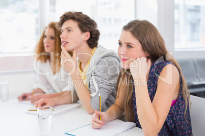 Fashion students being attentive in class