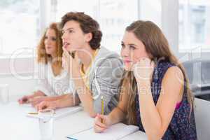 Fashion students being attentive in class