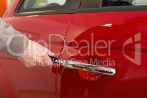 Man opening a car with a key