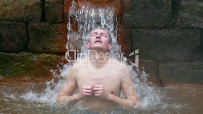 Man Taking Bath in Hot Springs Furnas, Azores, Portugal