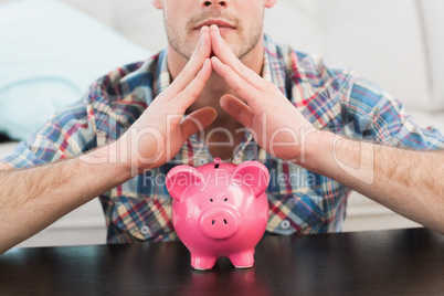 A man with piggy bank