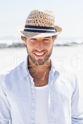 Handsome man smiling at camera on promenade Handsome man smiling at camera on promenade