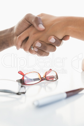 Handshake to seal a deal after a business meeting